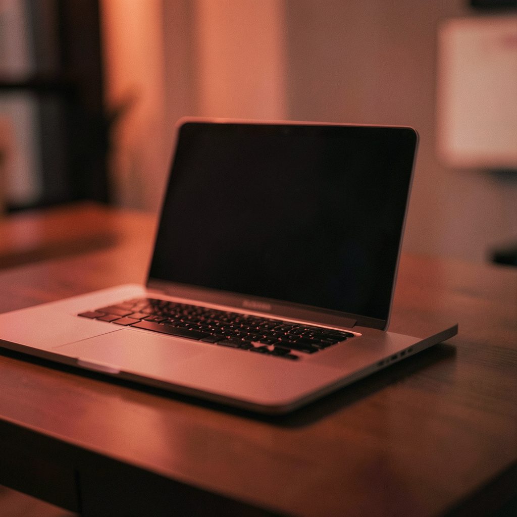 Laptop icon on a soft pastel circle